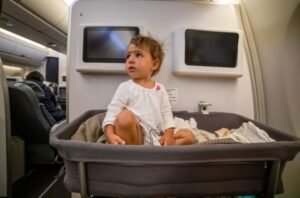 How to travel with a baby on a plane Without Losing Your Mind